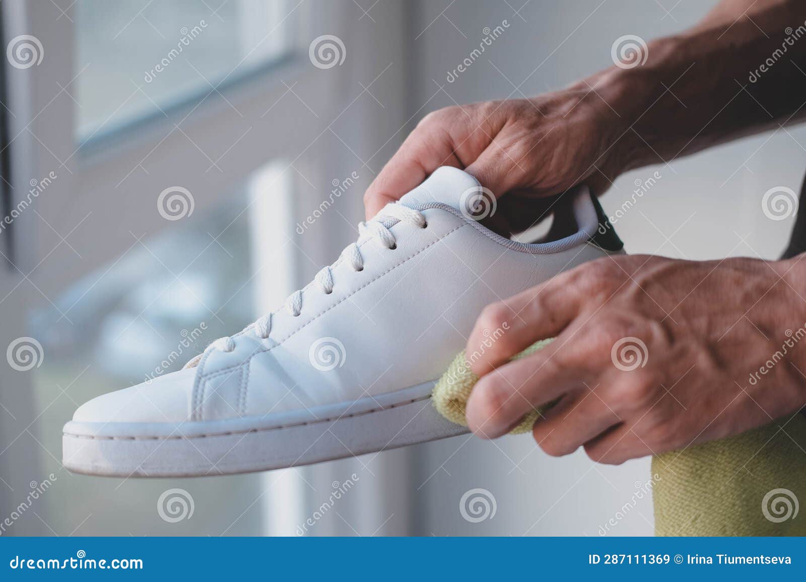 Man Cleans White Sneakers from Dirt Stock Image Image of closeup