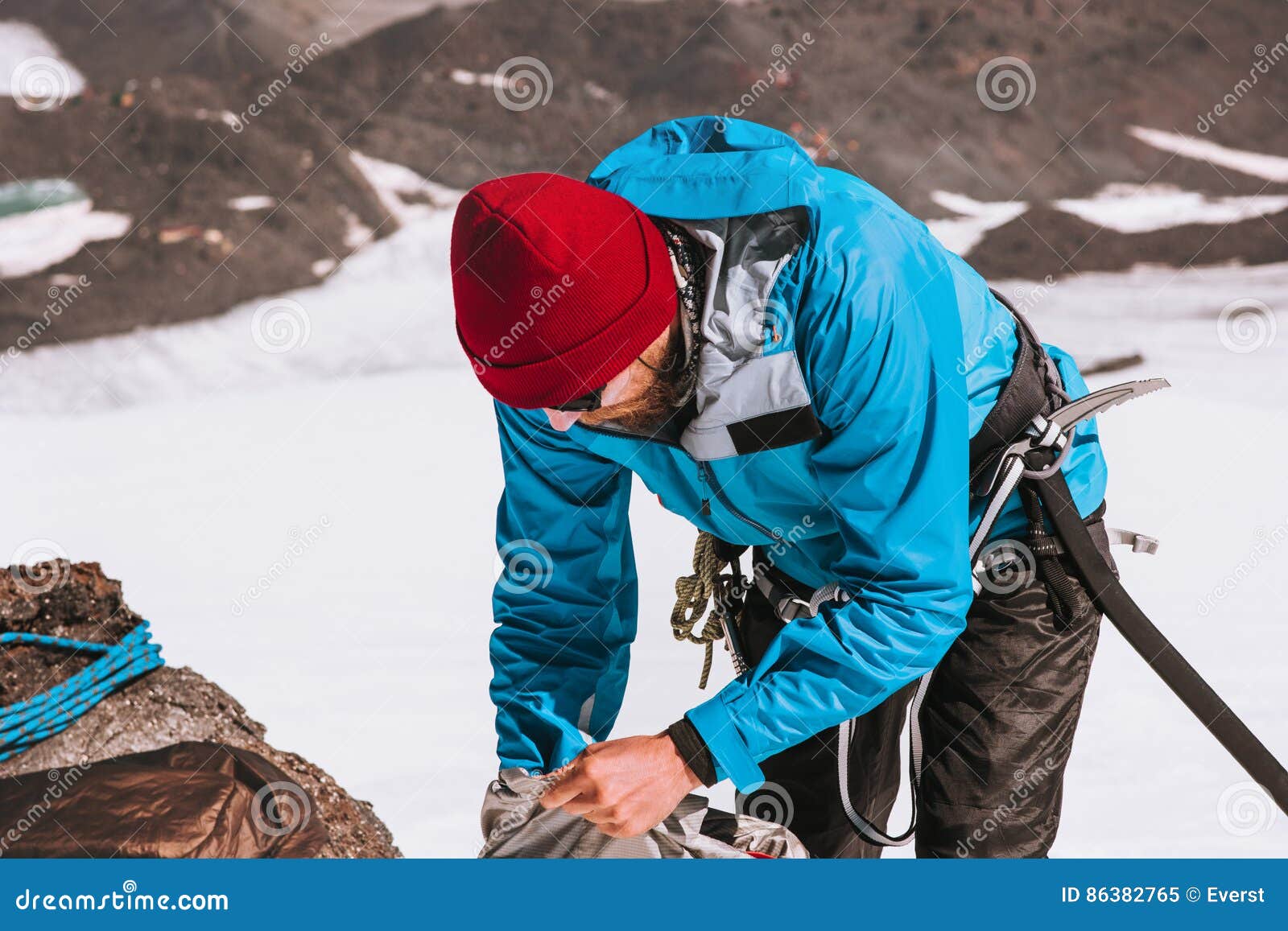 man climber packing backpack mountains alpinism