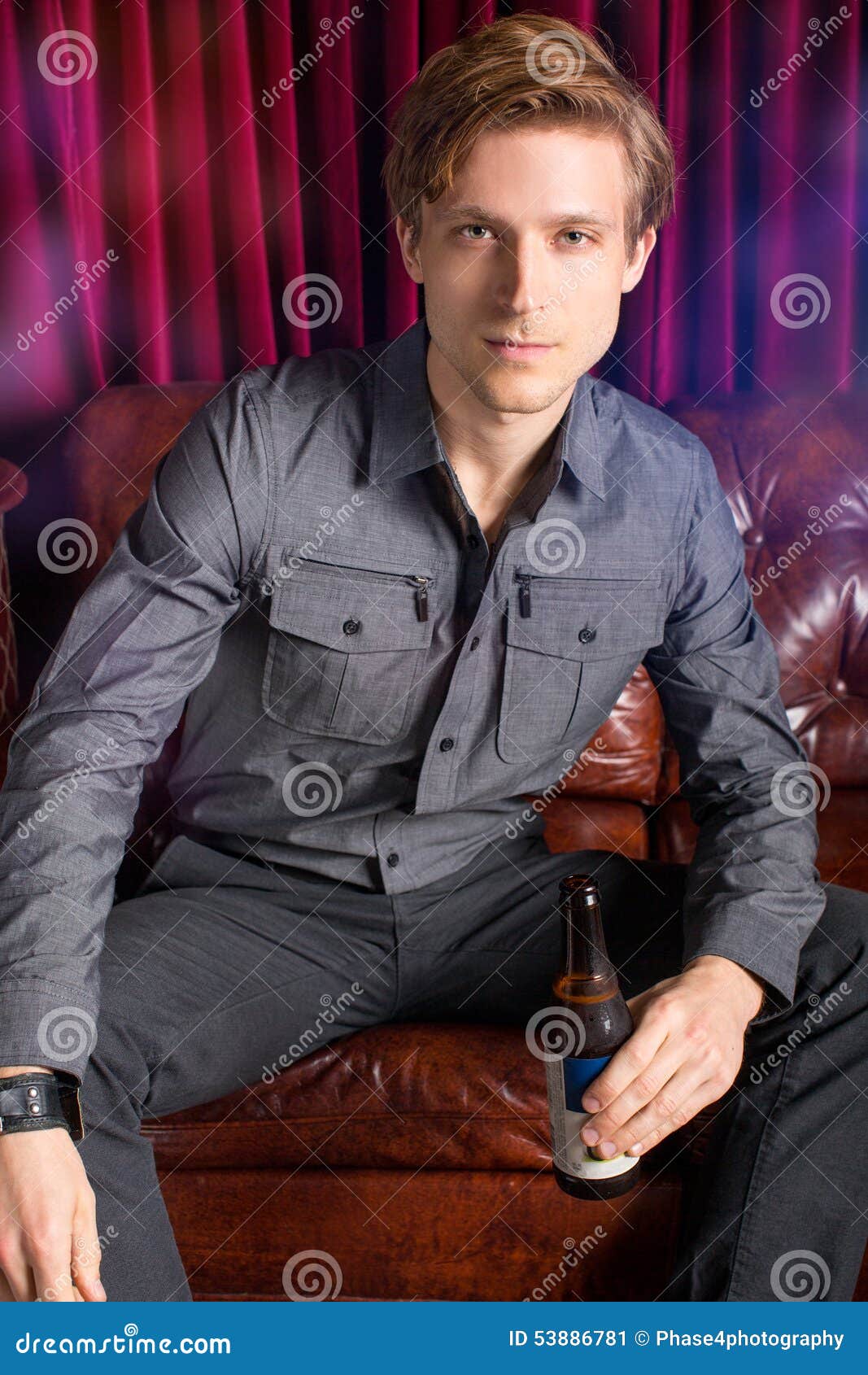 Man at club stock image. Image of home, leather, beverage 53886781