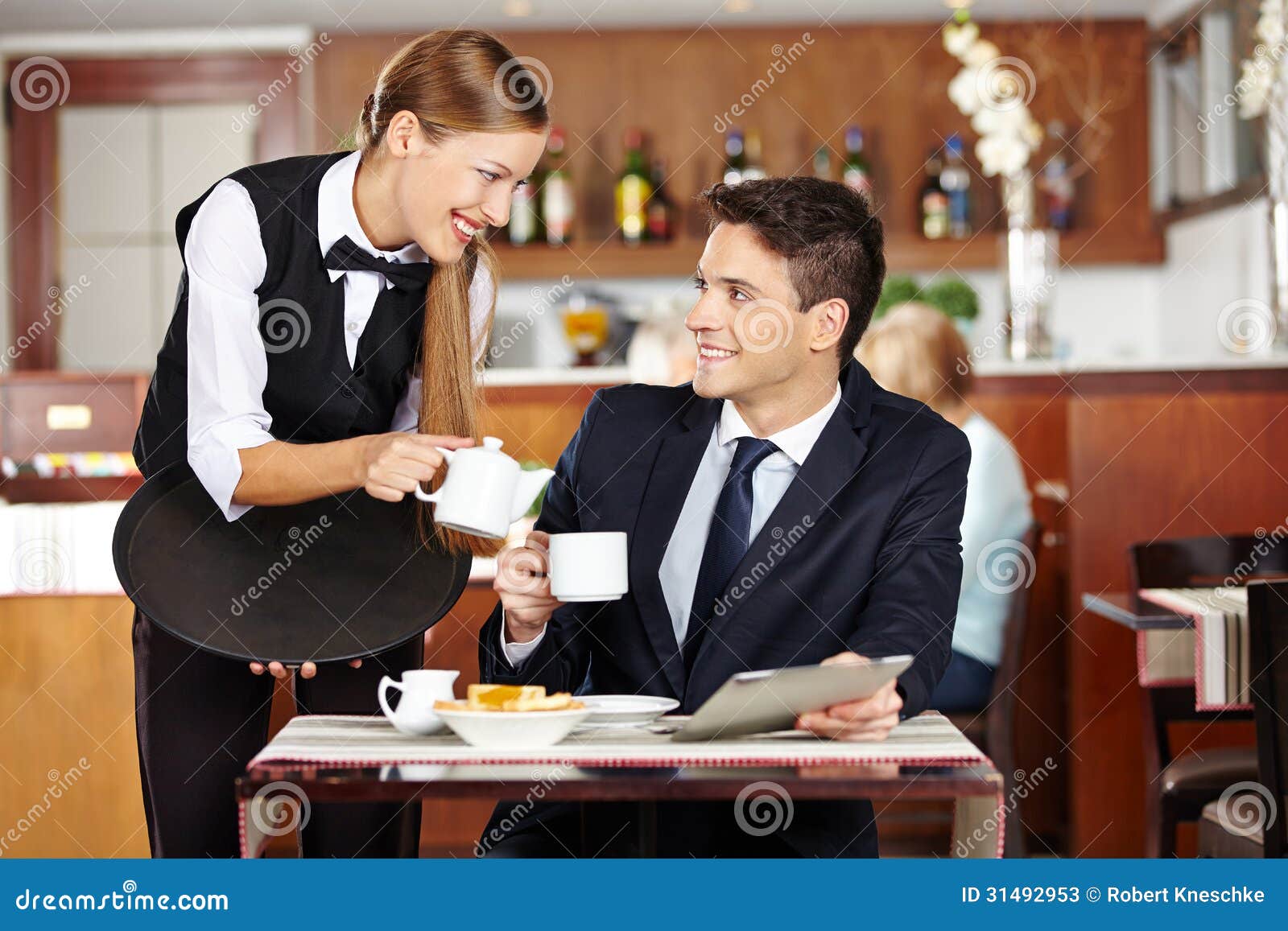 Man in Coffee Shop Flirting with Waiter Stock Image photo