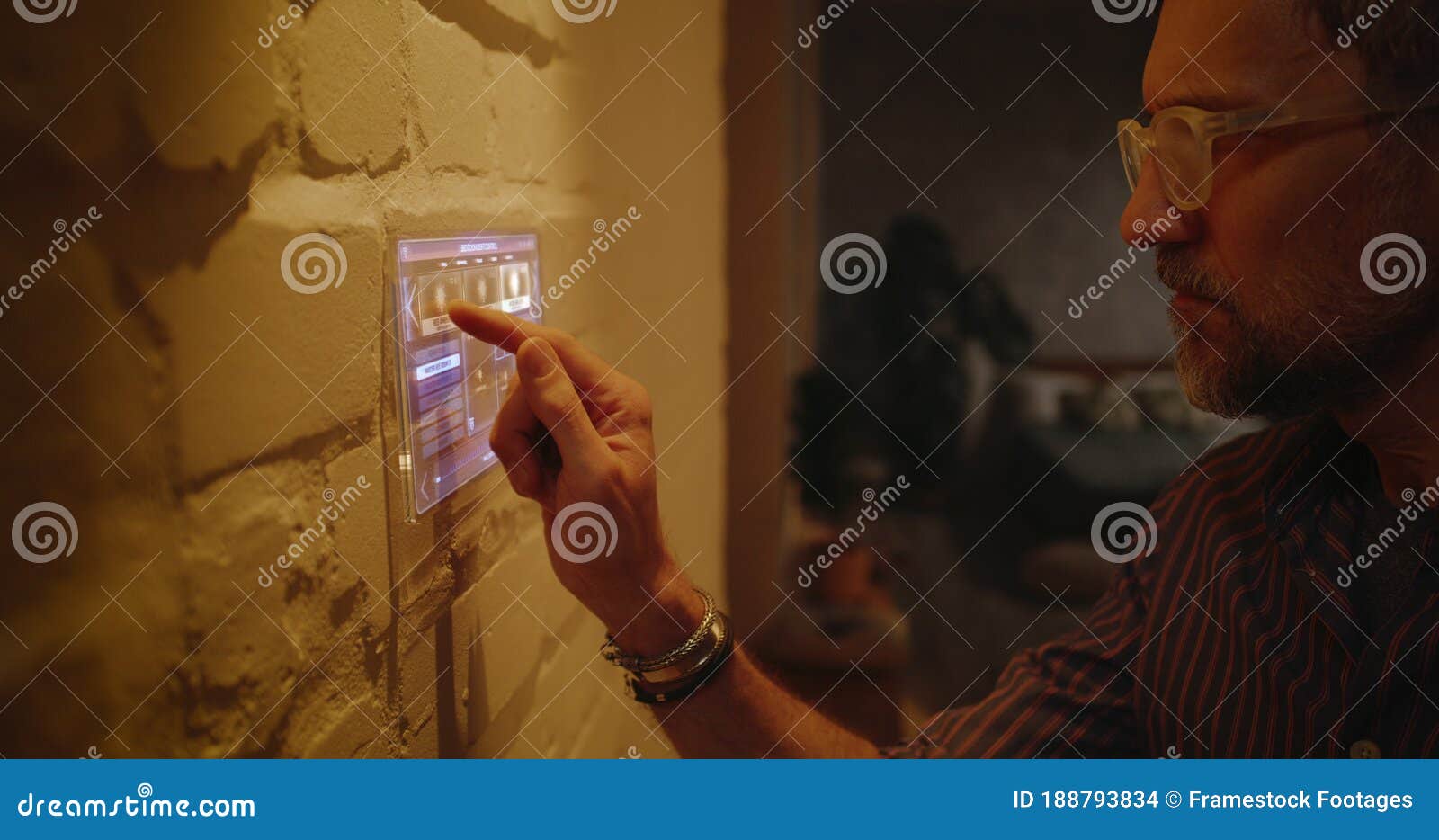 Man Controlling Lighting with Home Hub Stock Photo Image of bedroom