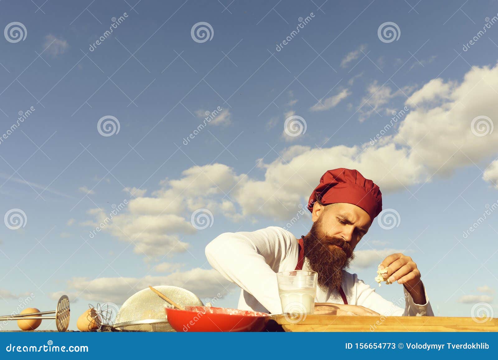 berded man chef cooking outdoor