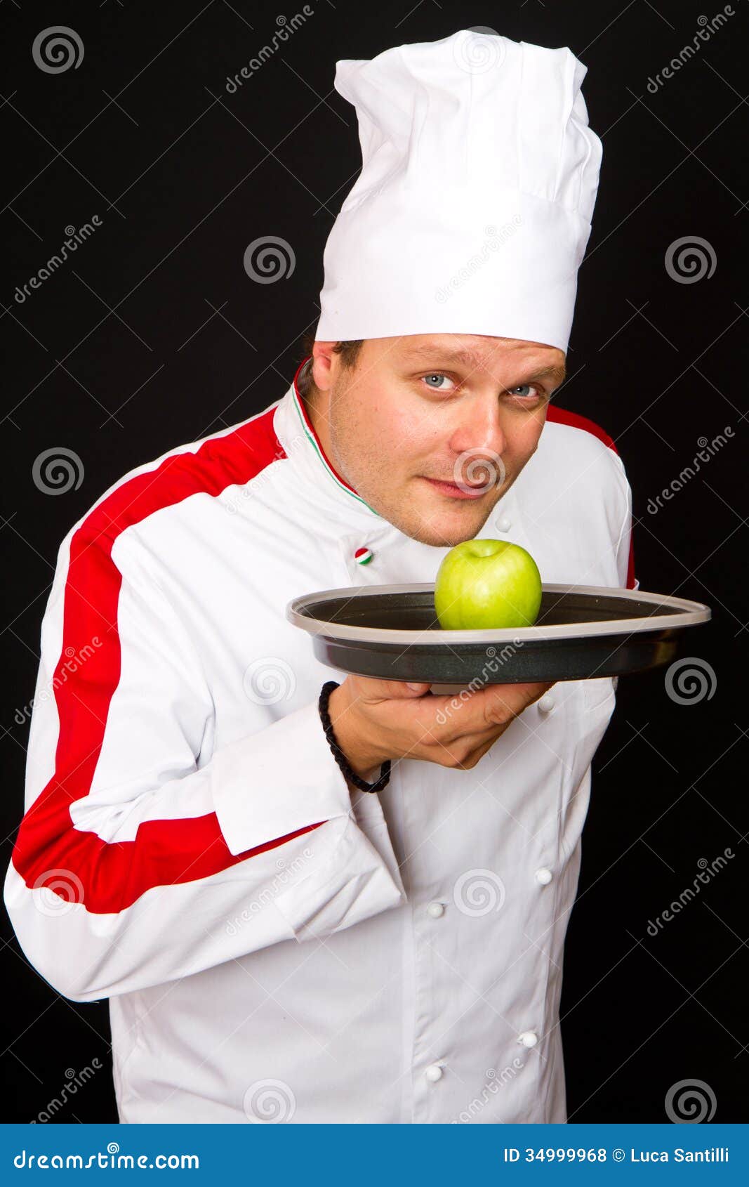 Man Cook in Chef Hat with Green Apple Stock Photo Image of male