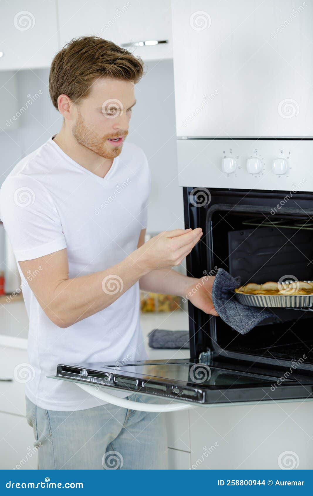 Man Cooking at Home Burns Fingers on Oven Stock Photo Image of