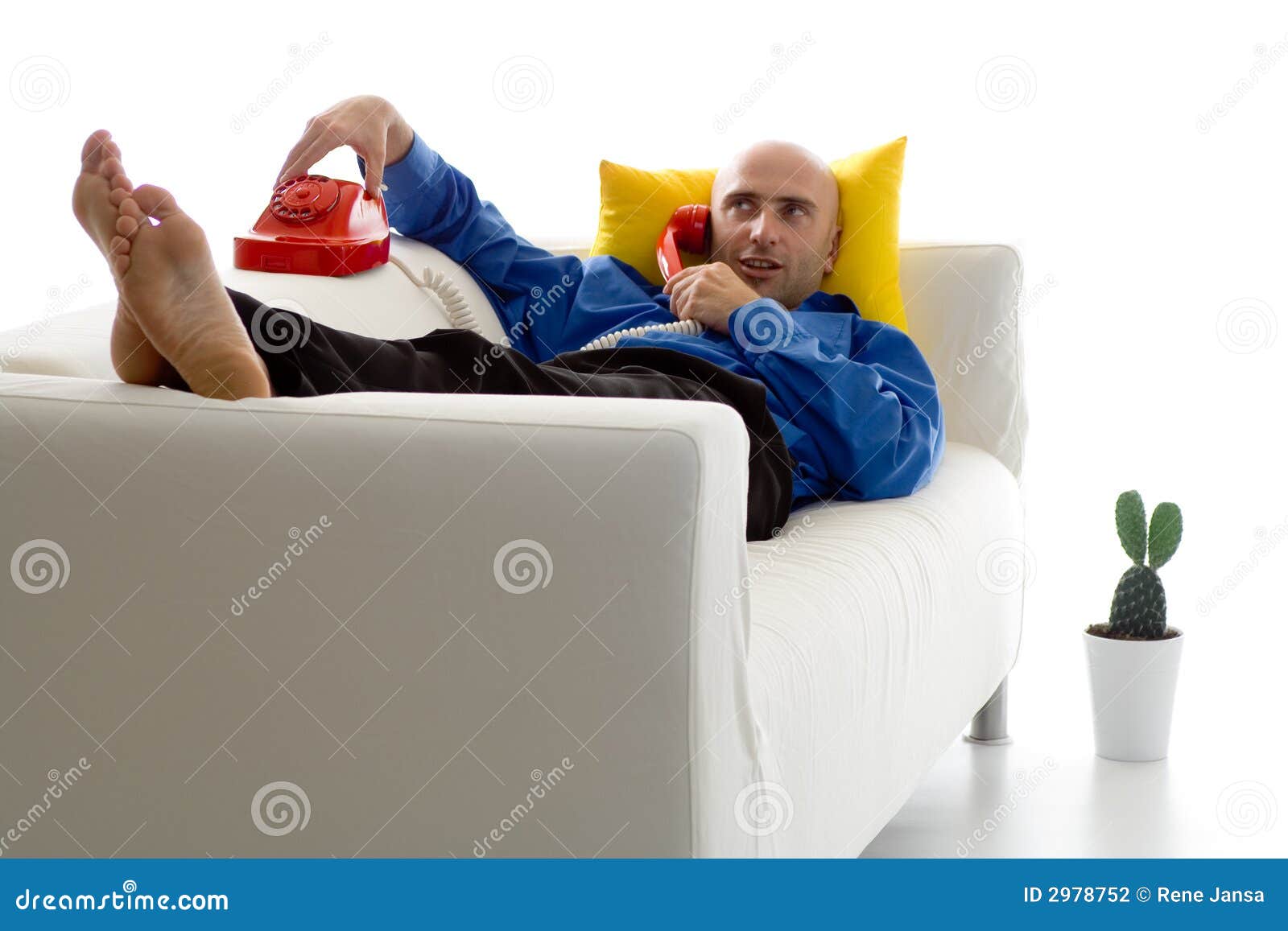Man on couch with phone stock photo. Image of adult, comfortable 2978752