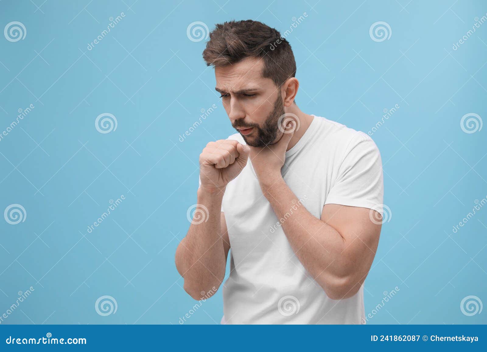 Man Coughing on Light Blue Background, Space for Text. Cold Symptoms