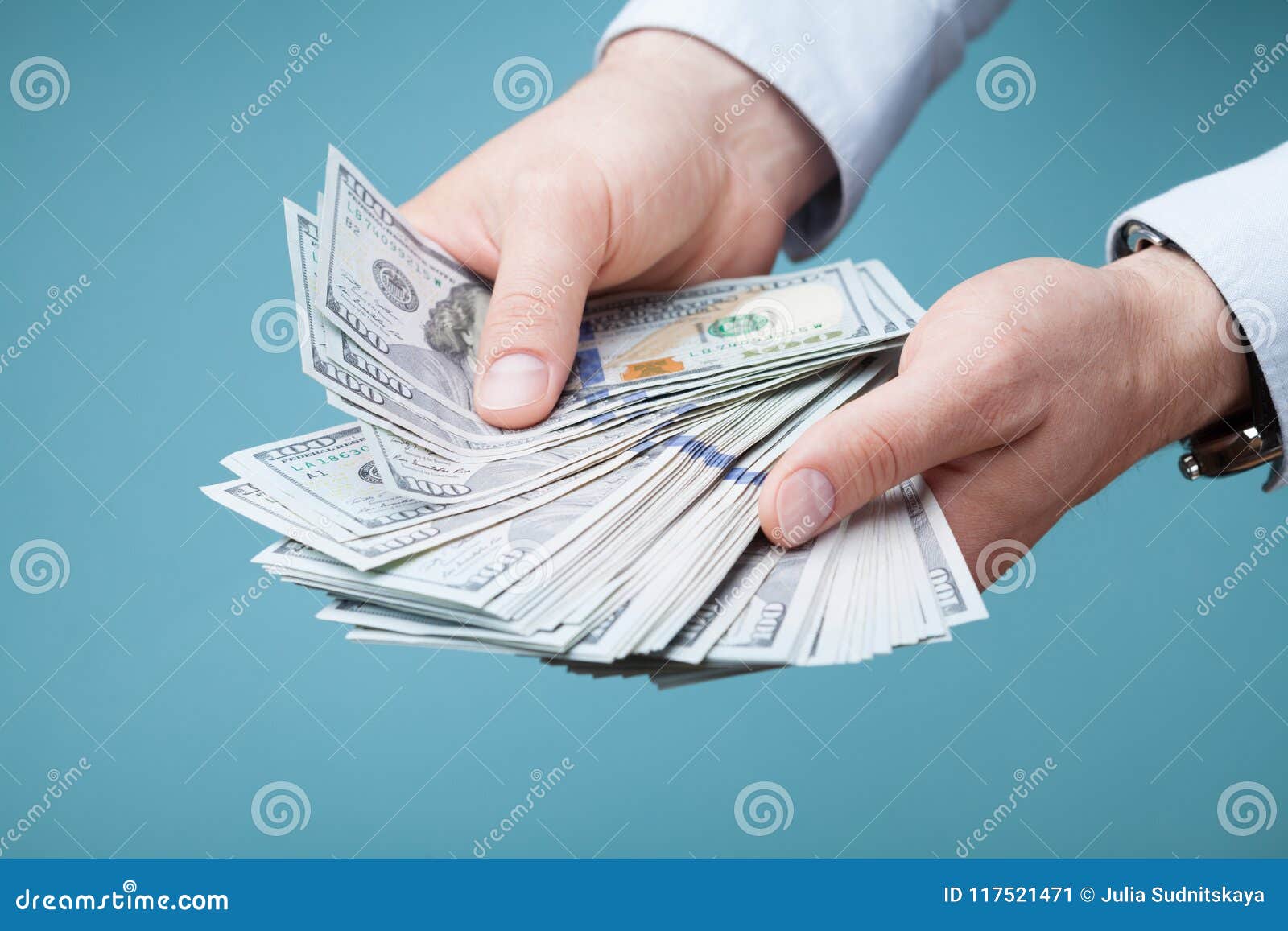 man count money cash in his hand. finance, saving, salary and donate concept.