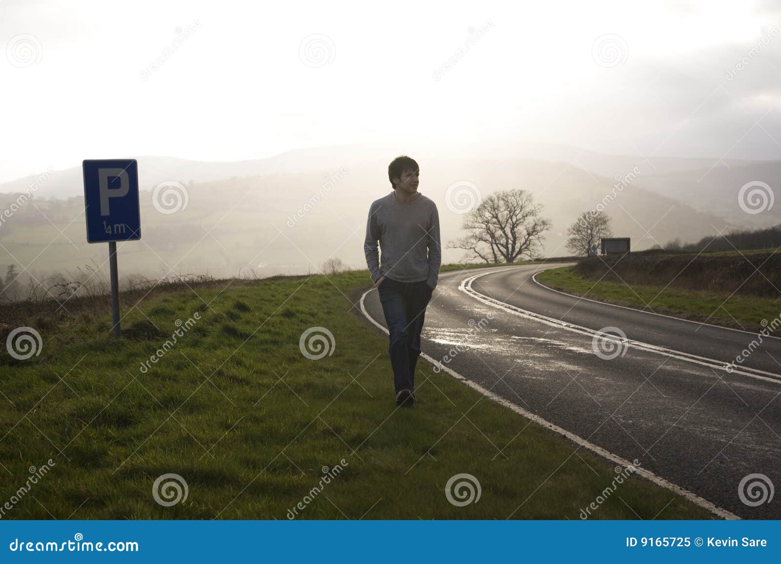 Man on Country Road stock image. Image of countryside 9165725