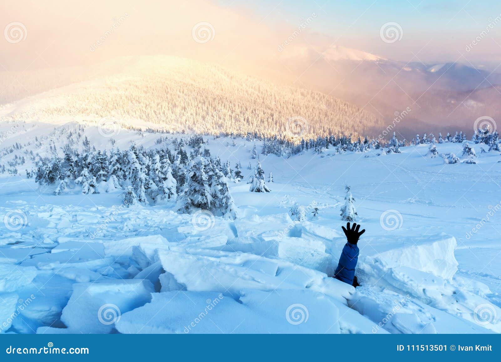 a man covered with a snow avalanche