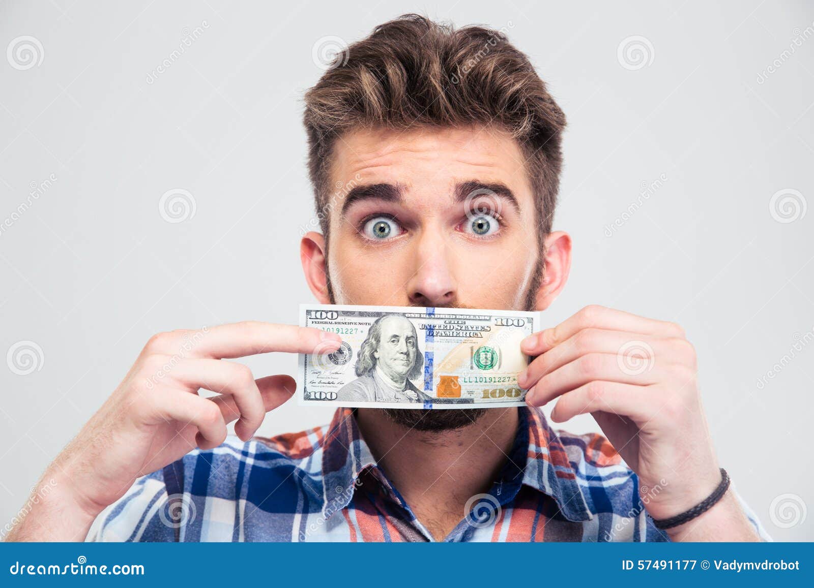 Man covering his mouth with bill of USA dollar - man-covering-his-mouth-bill-usa-dollar-portrait-young-isolated-white-background-57491177