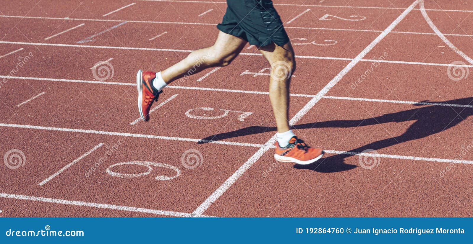 Man Crossing the Finish Line at the Track Stock Photo - Image of ...