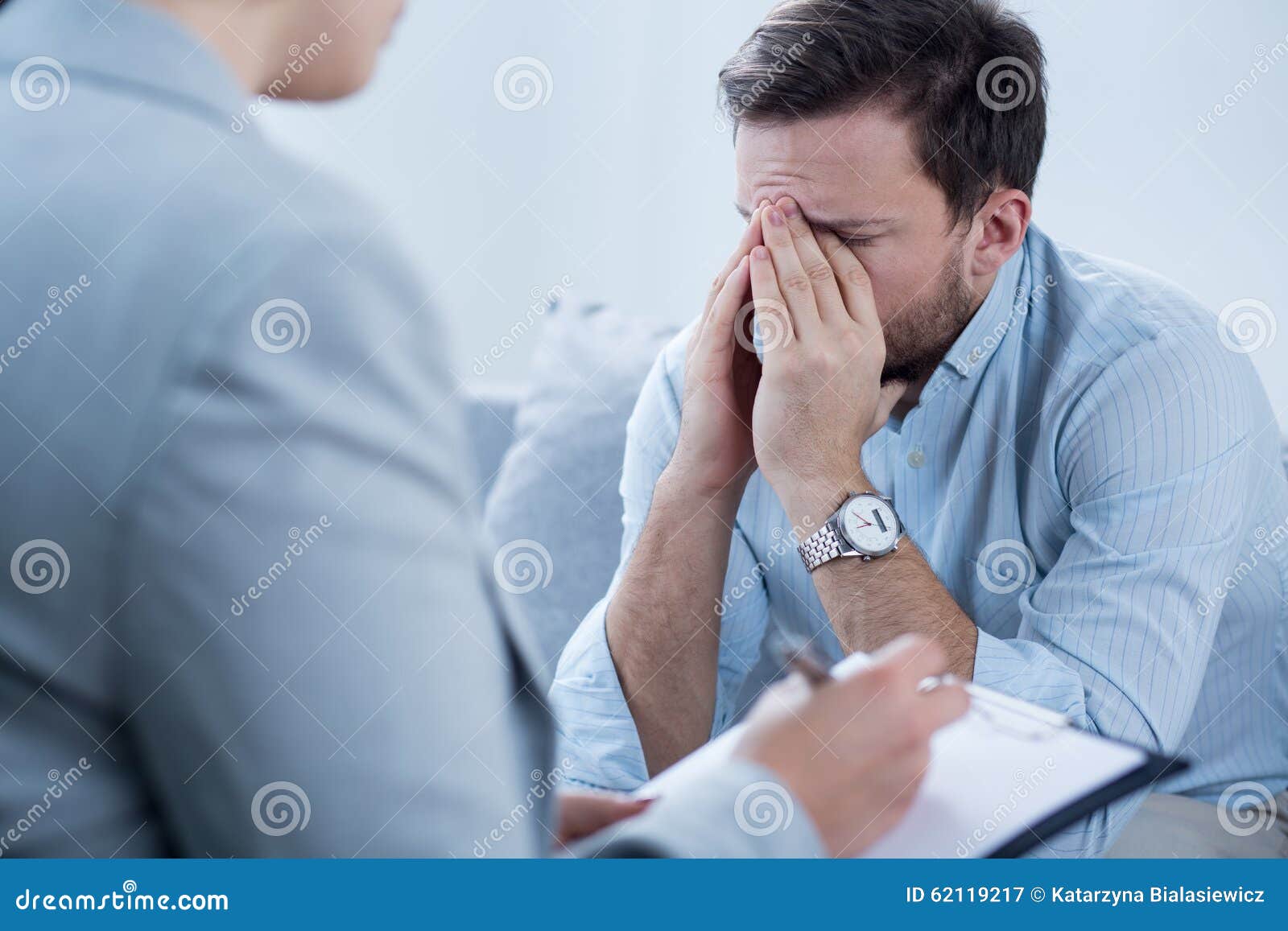 man crying during psychotherapy