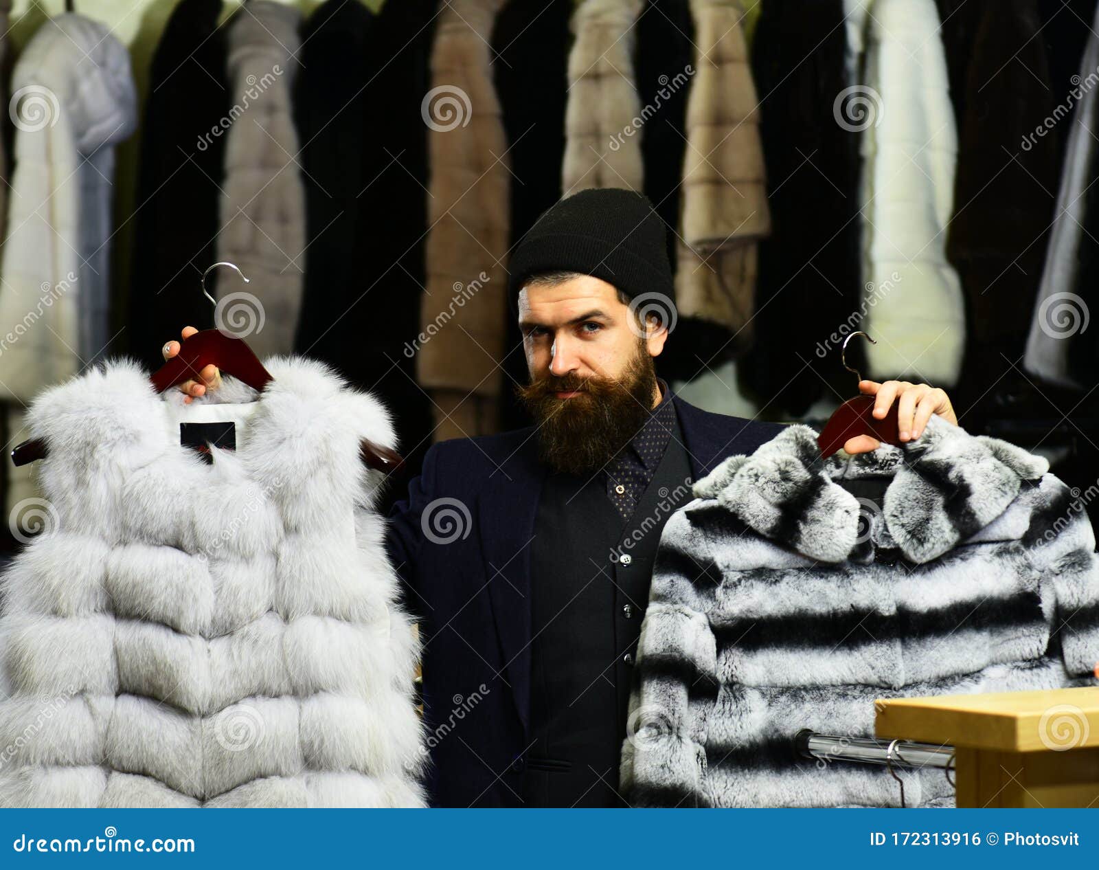 Man with Cunning Face Holds Furry Coats Stock Photo - Image of discount ...