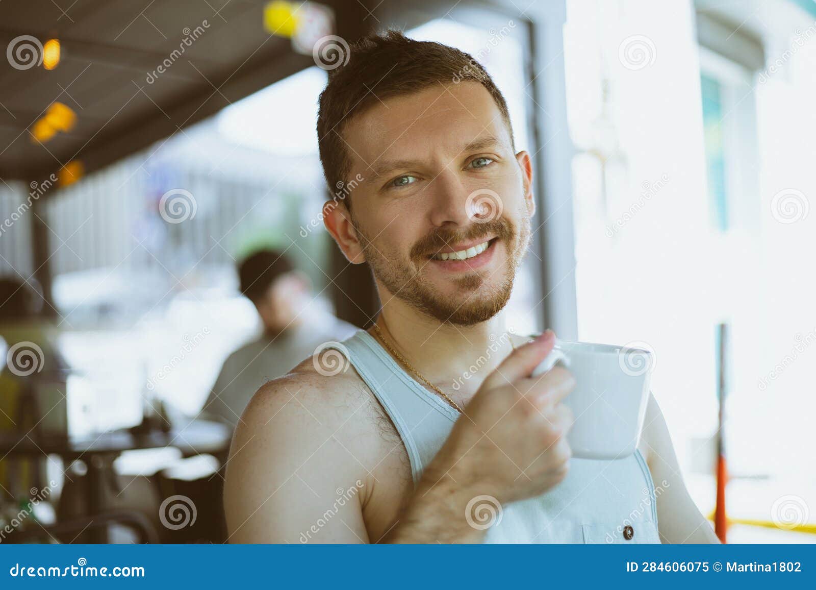 Man with a cup of coffee stock image. Image of business - 284606075