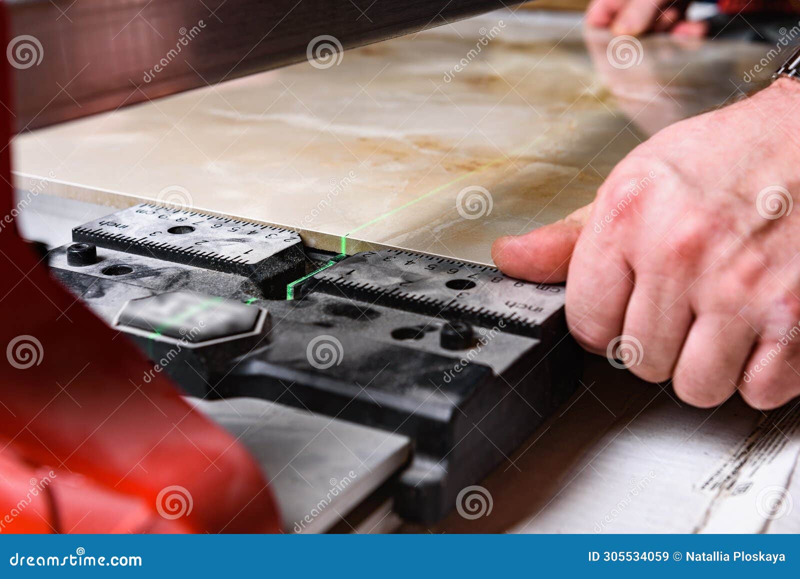 Man Cutting Ceramic Tile with Manual Tile Cutter. Stock Image Image