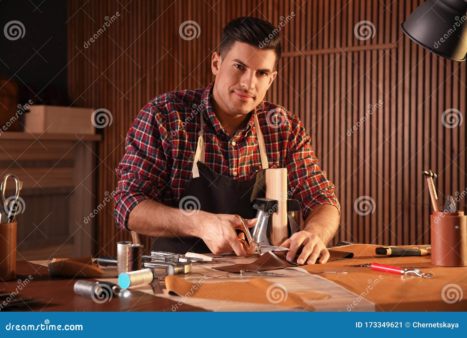 Man Cutting Leather with Scissors Stock Image Image of industry