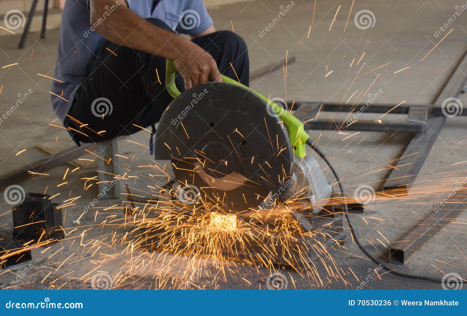 Man cutting steel stock photo. Image of equipment, janitor 70530236