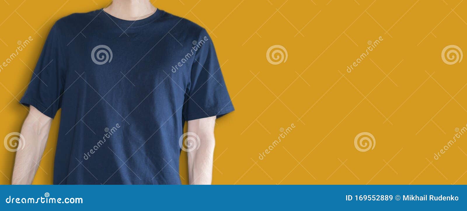 Download Man In The Dark Blue T-shirt Mockup And Copy Space Against The Color Wall Backround, No Face ...