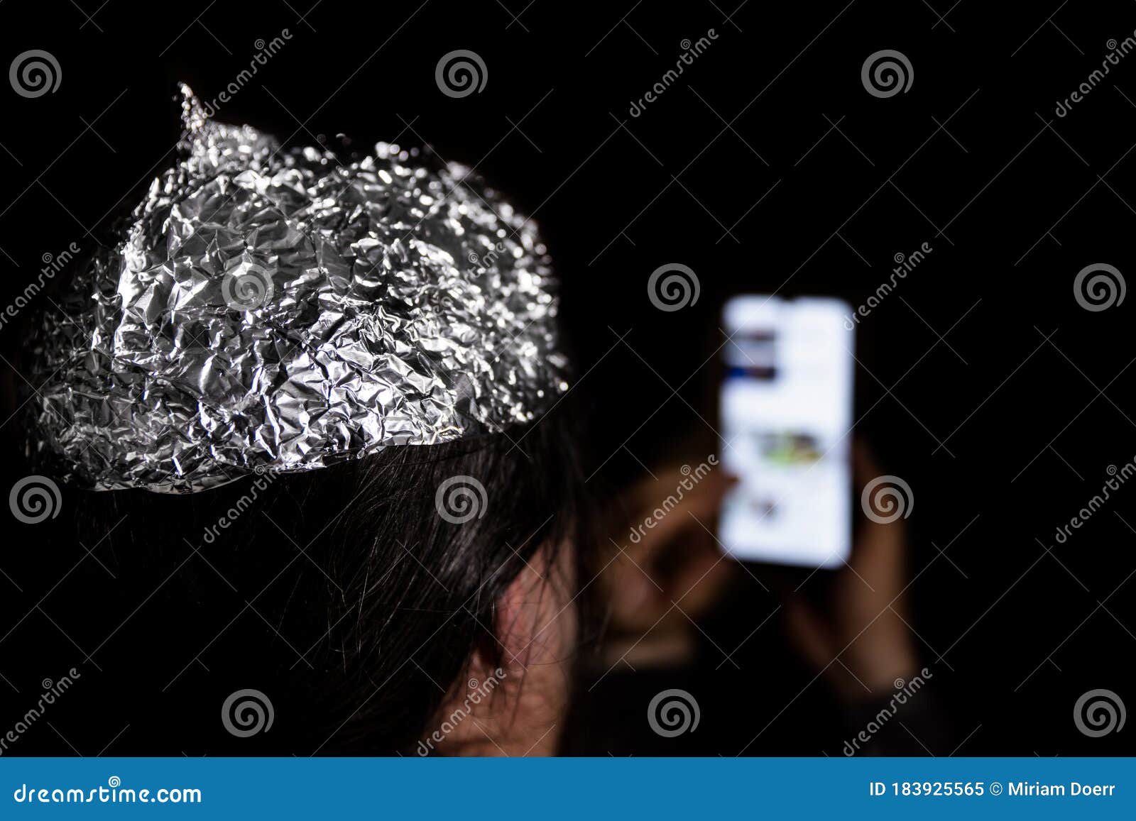 https://thumbs.dreamstime.com/z/man-dark-wearing-tin-foil-hat-smartphone-hand-conspiracy-theory-mind-control-183925565.jpg