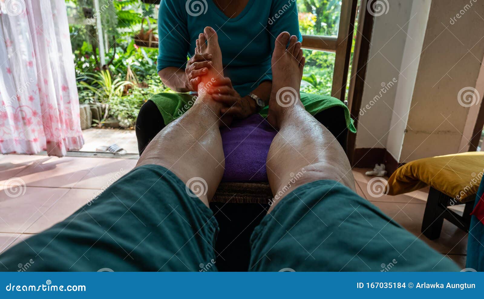 A Man Doing Foot Massage A Thai Massage In A Place In Chiang Mai