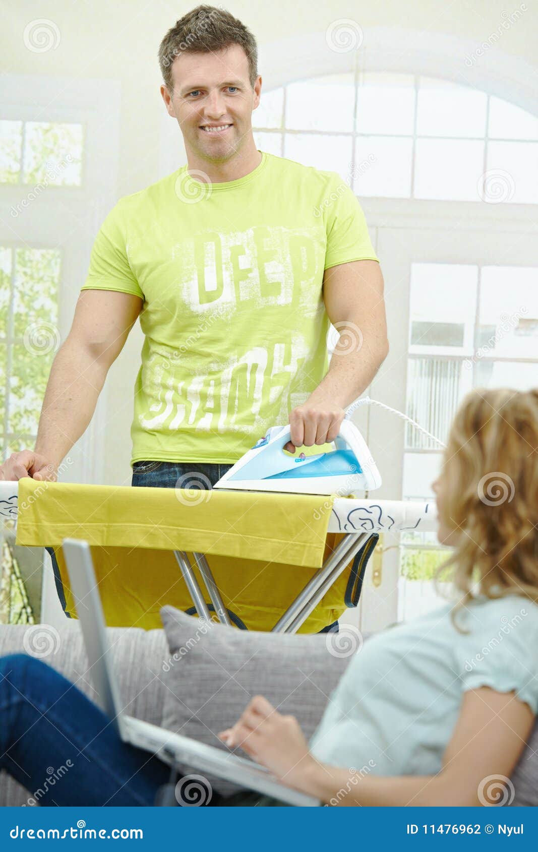 Man doing ironing stock photo. Image of clothing, expression 11476962