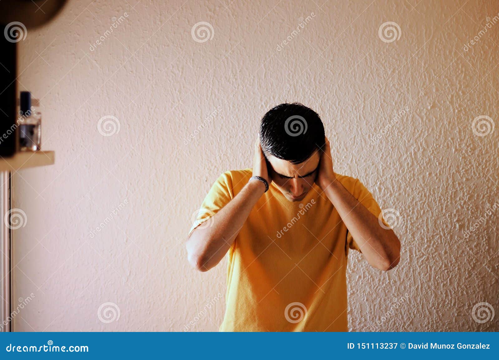 Man Dressed in Yellow with a Headache. Stock Image Image of yellow