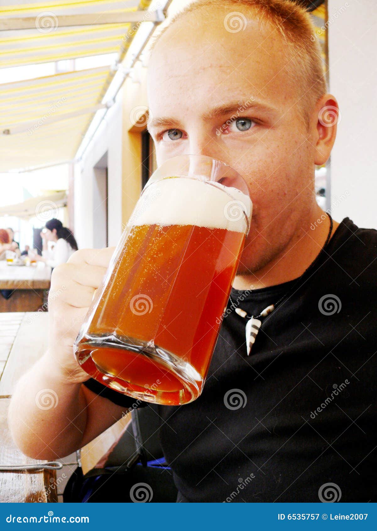 Man drinking beer stock image. Image of large, beverage 6535757