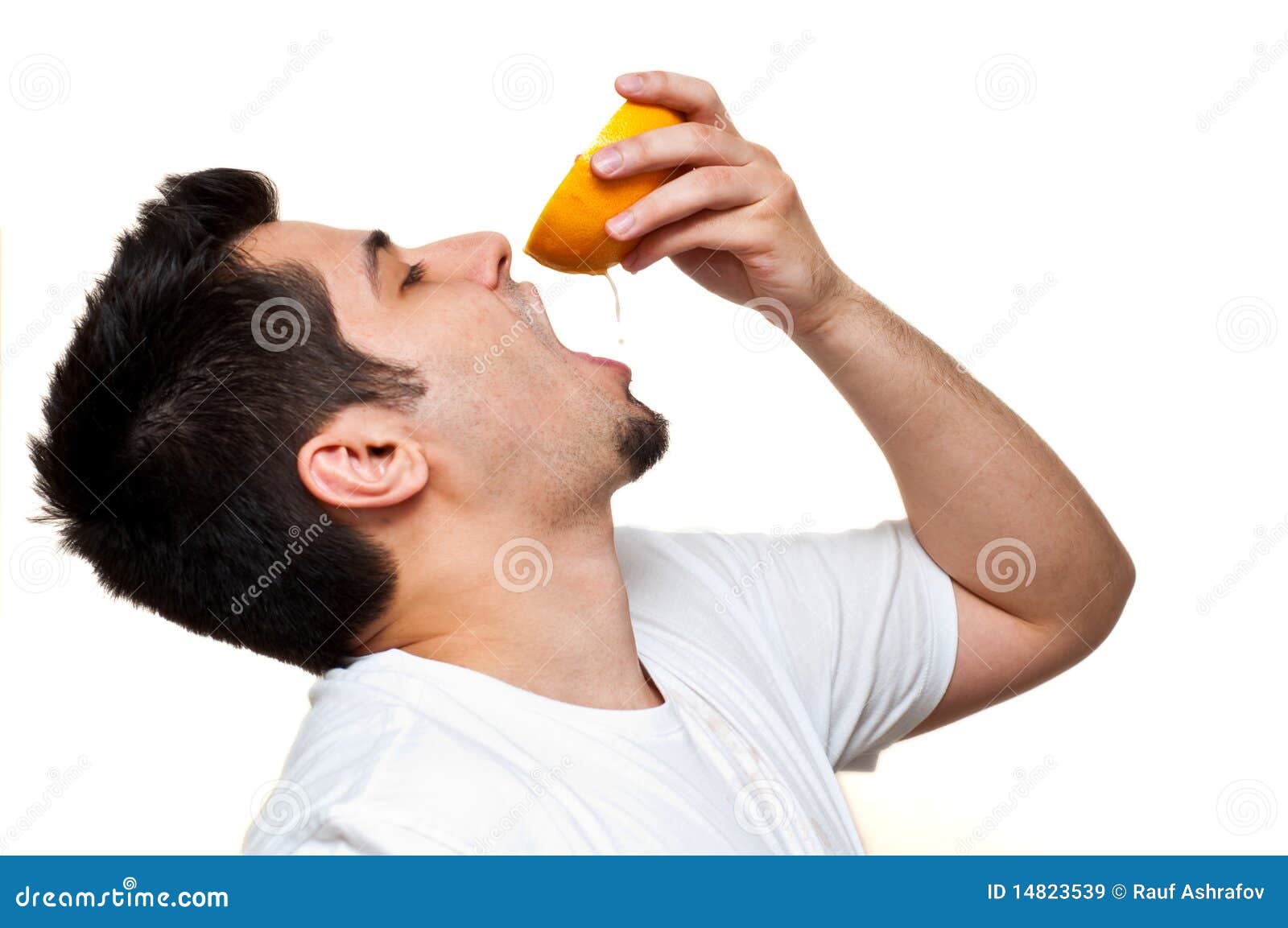 Man Drinking Out of Grapefruit Stock Image Image of eyes, citrus