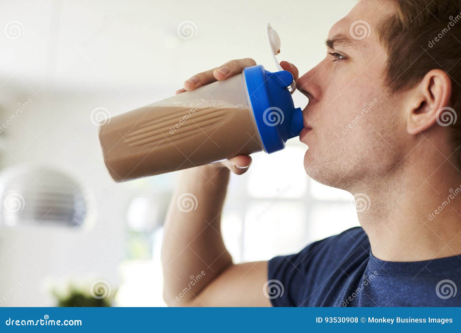 Man Drinking Protein Shake in Kitchen at Home Stock Photo Image of
