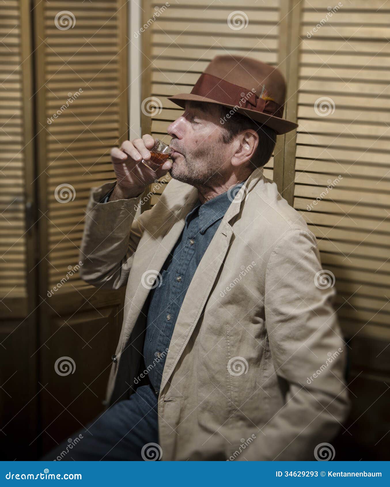 Man Drinking from Shot Glass_1 Stock Image Image of sadness