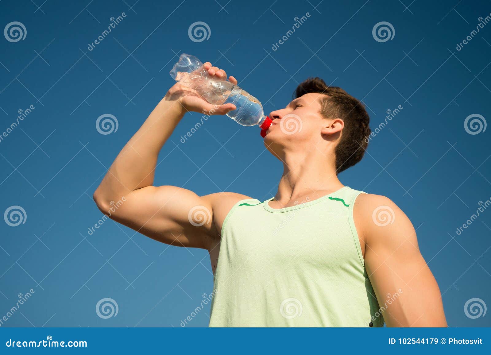 Man Drinking Water from Bottle on Sunny Day Stock Image - Image of ...