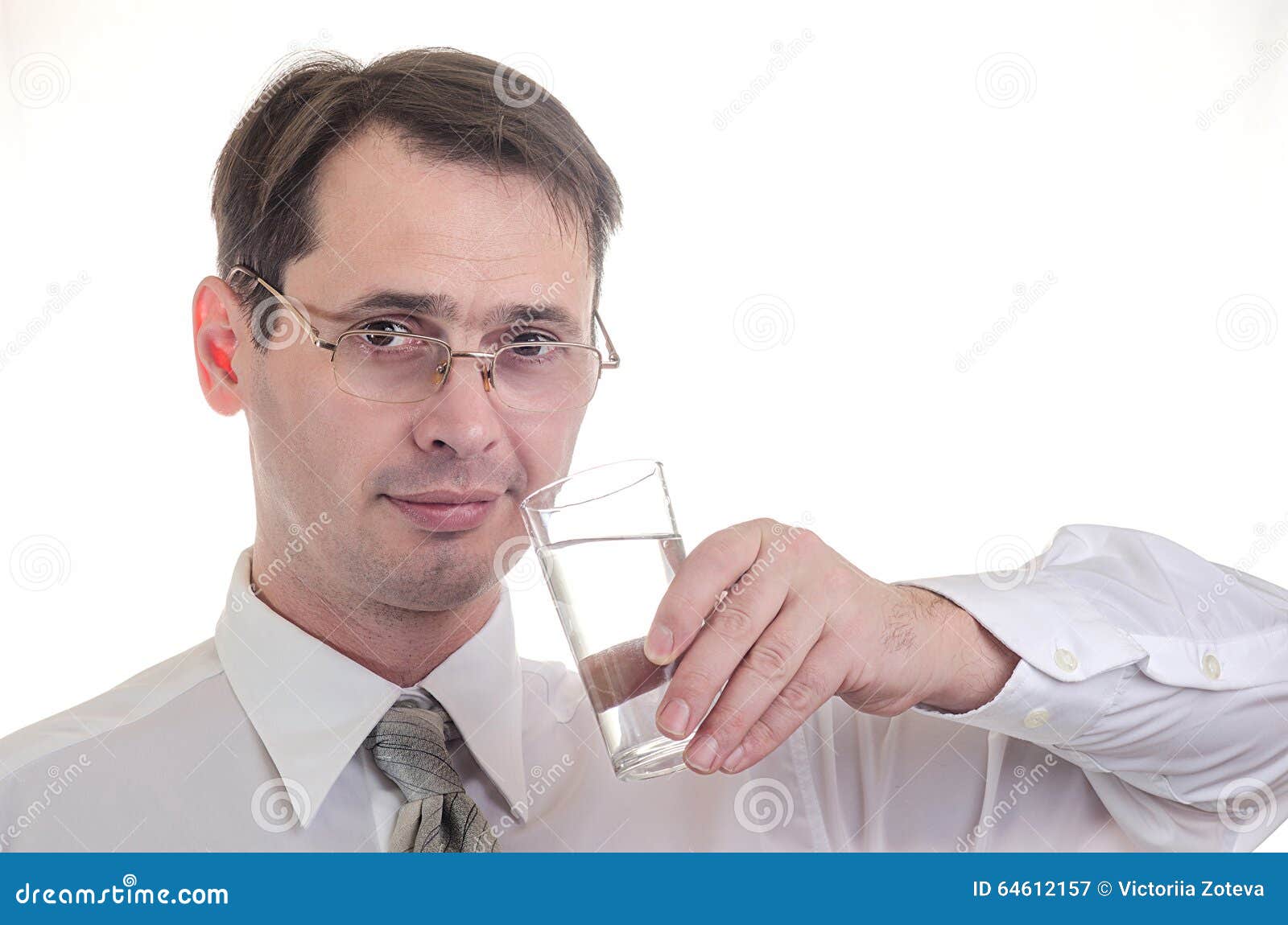 The man drinks water. stock image. Image of serious, glass 64612157