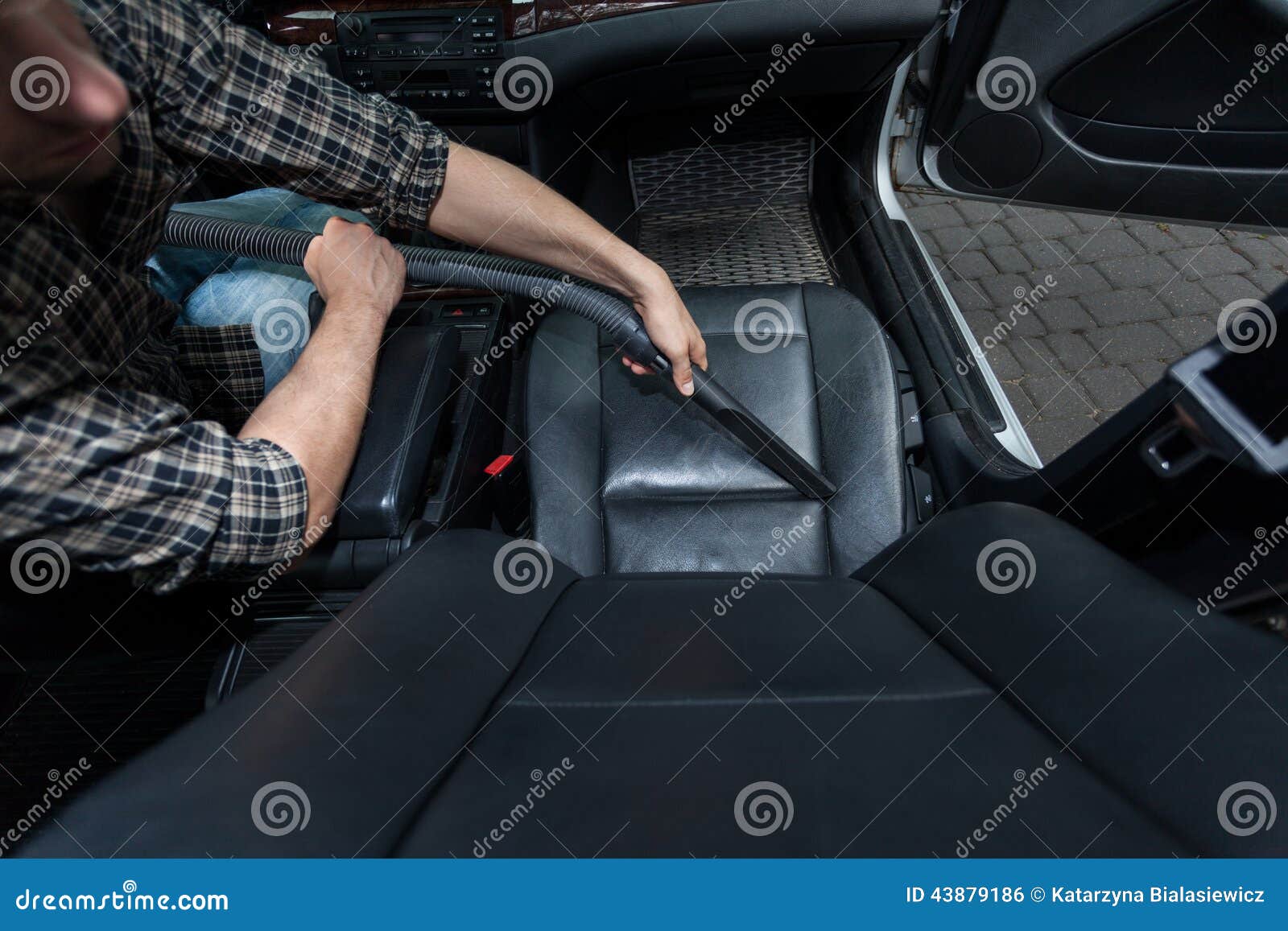 Man dusting car s chair stock photo. Image of travel 43879186