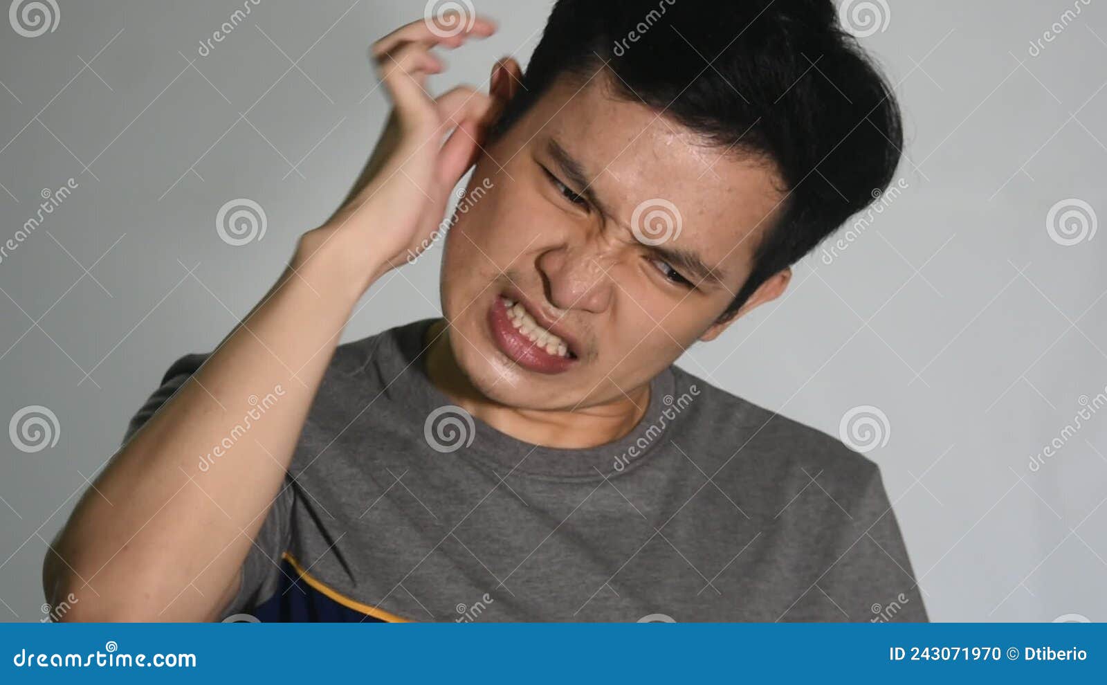 A Man with Ear Irritation stock footage. Video of sound 243071970