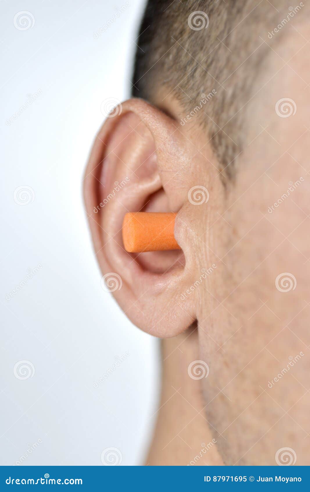 Man with an Earplug in His Ear Stock Image Image of colorful, action