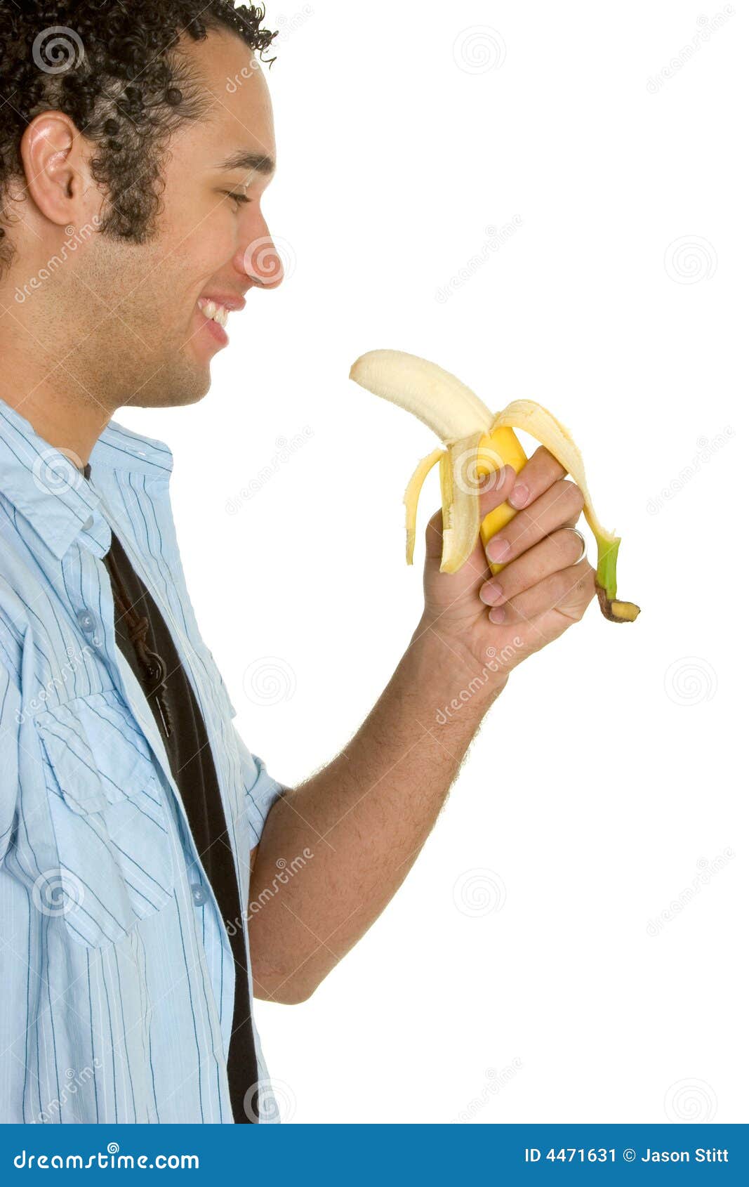Man Eating Banana stock image. Image of isolated, ripe 4471631