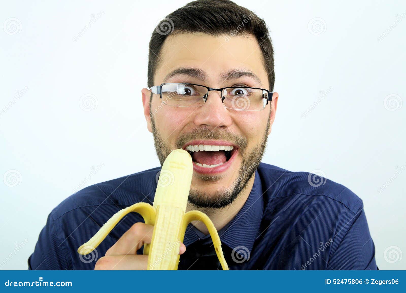 Man eating a banana stock photo. Image of morning, suit 52475806