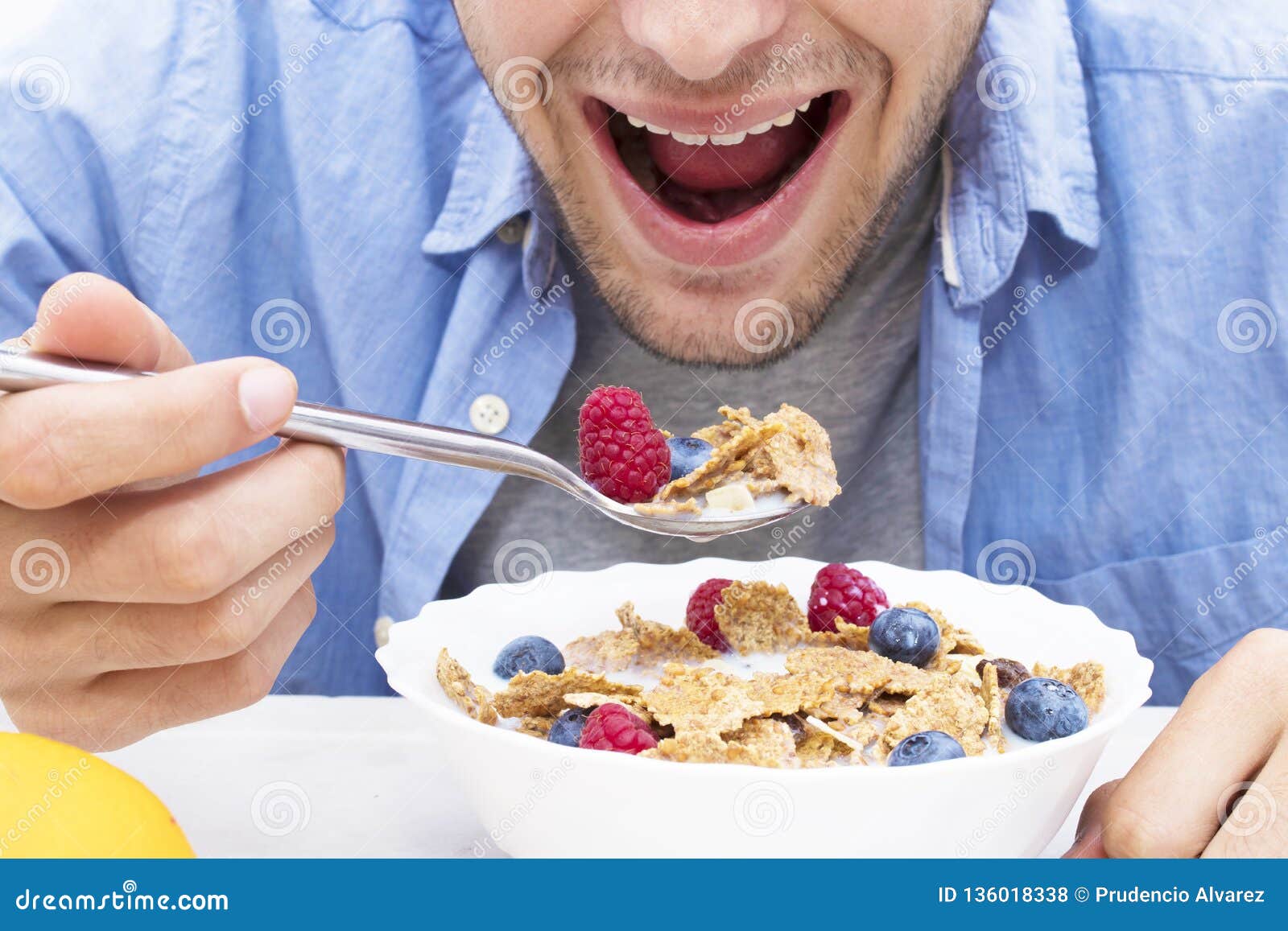 Man Eating Cereal with Fruit Stock Photo Image of healthy, natural