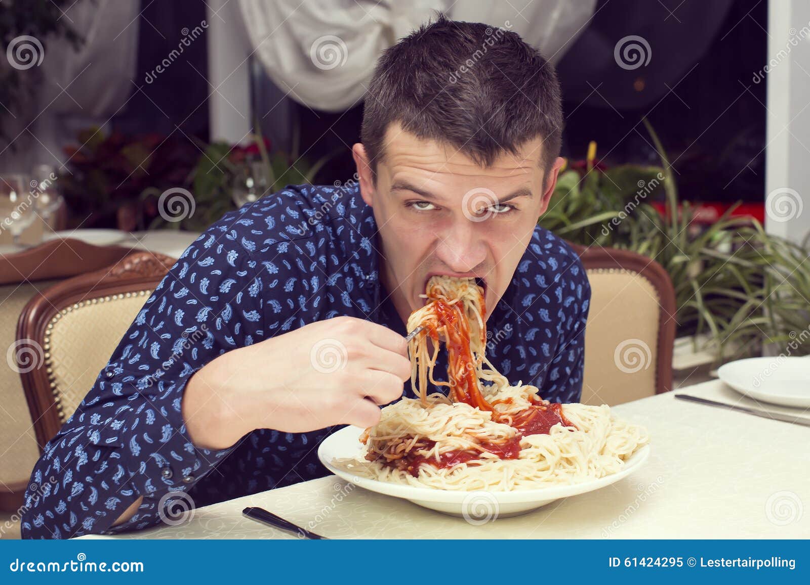 Man Eating a Large Portion of Pasta Stock Image Image of couple