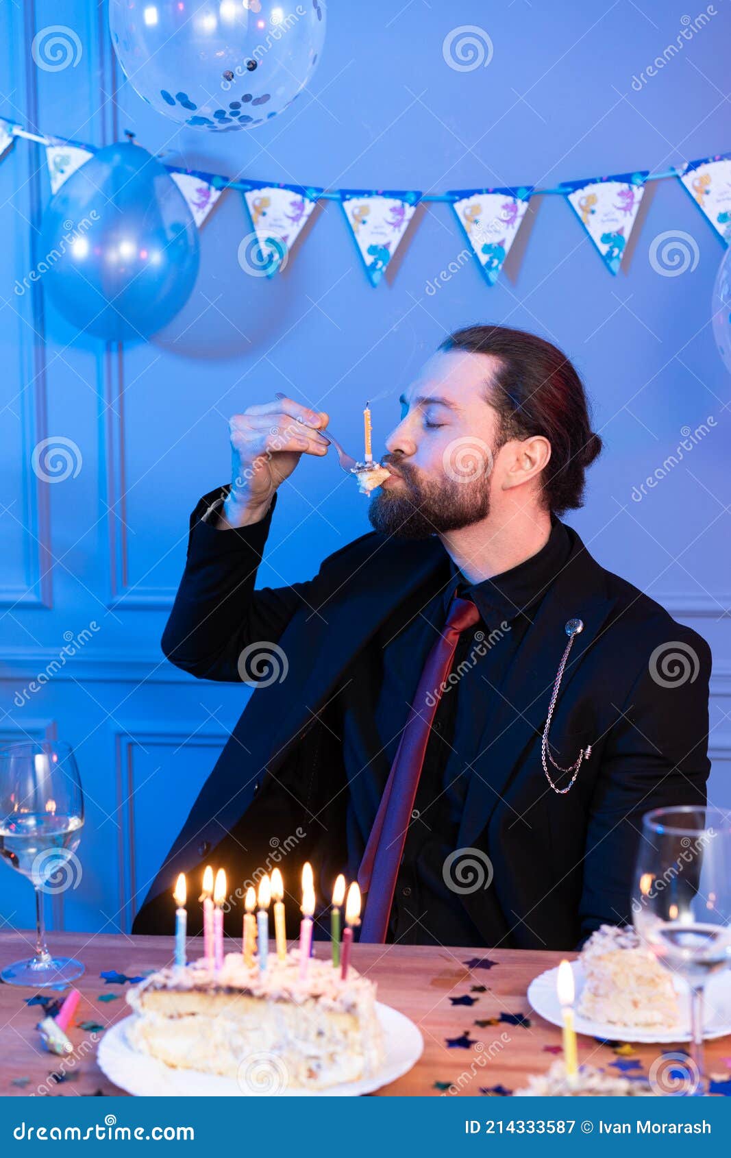 A Man Eats a Cake from a Fork with His Eyes Closed. Birthday ...