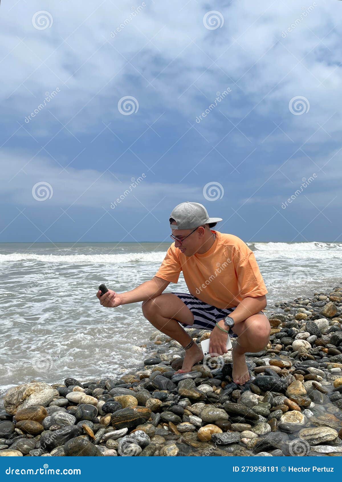 man enjoying the sea on a sunny day