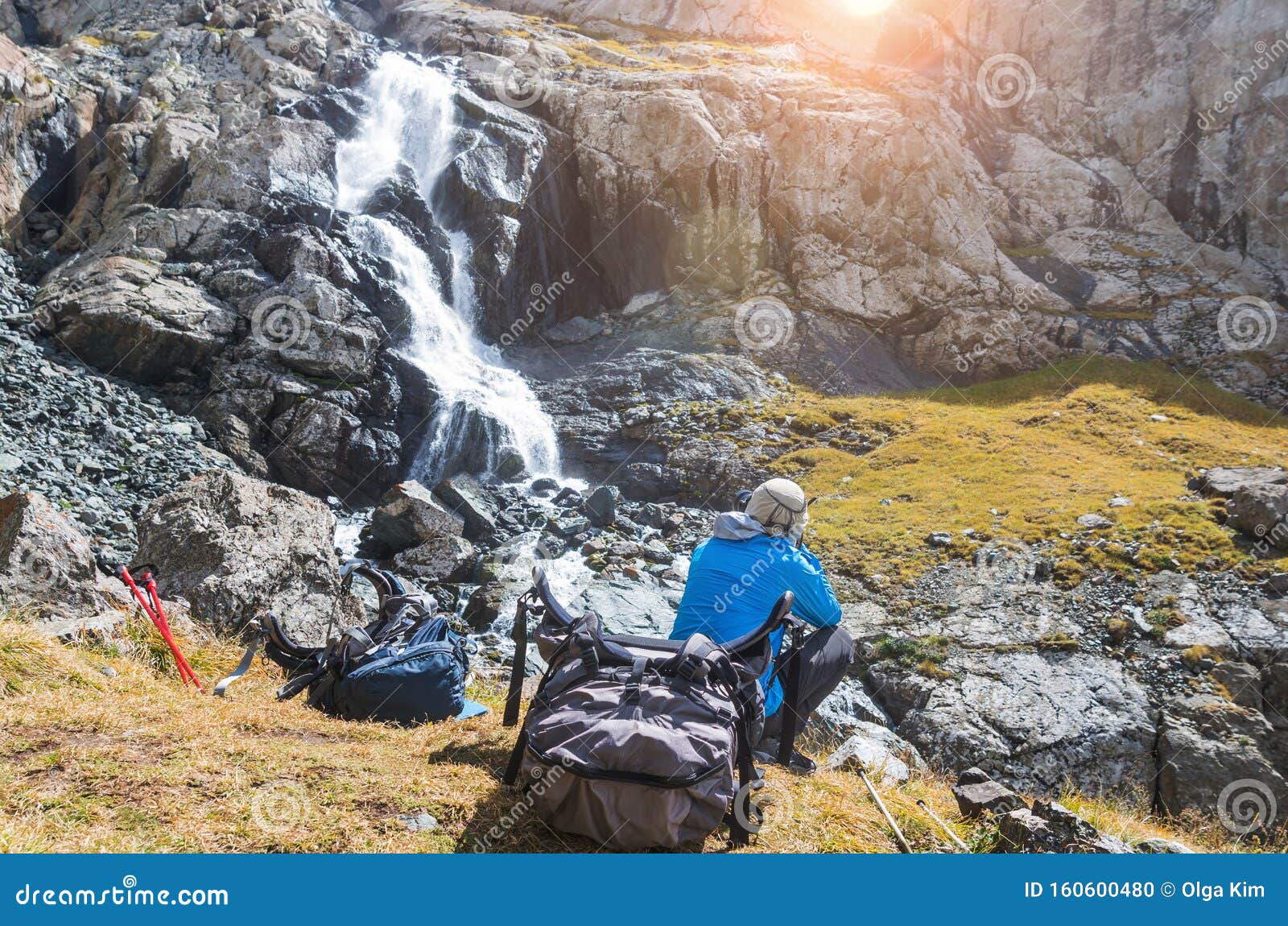 Man Enjoying Tranquility Near a Mountain River Stock Photo Image of
