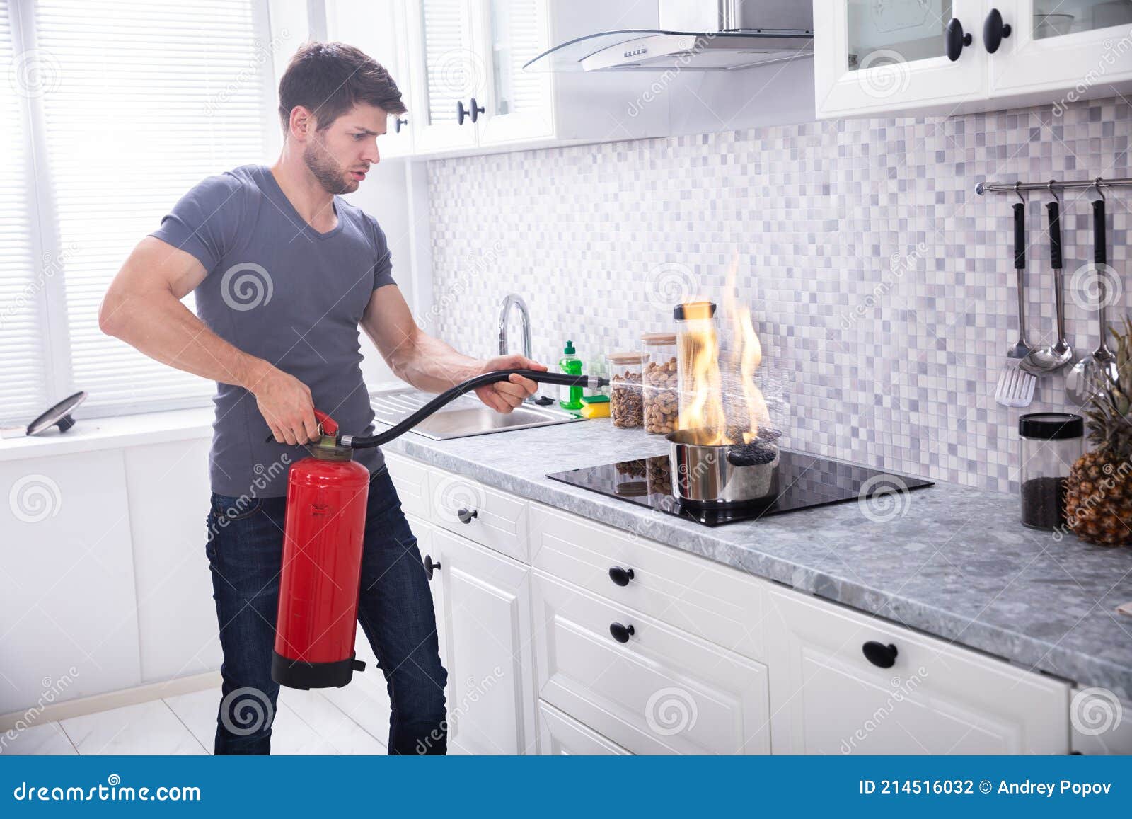 Man Extinguishing Burning Cooking Pot Stock Photo Image of people, home 214516032