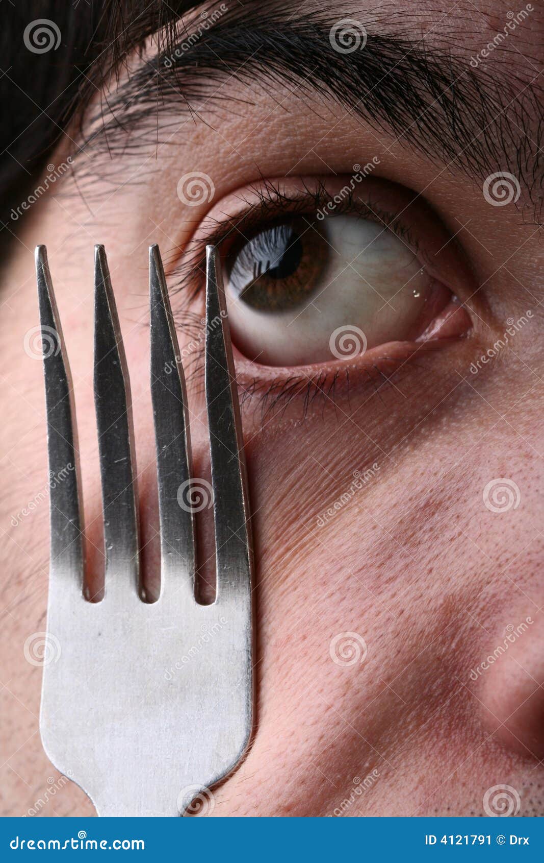 Man eye and fork stock image. Image of anger, looking 4121791