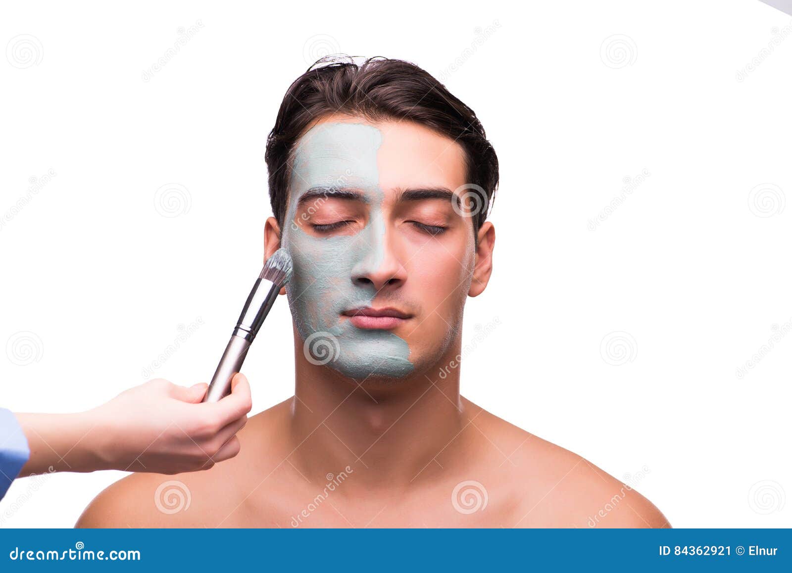 The Man with Face Mask Being Applied on White Stock Image Image of