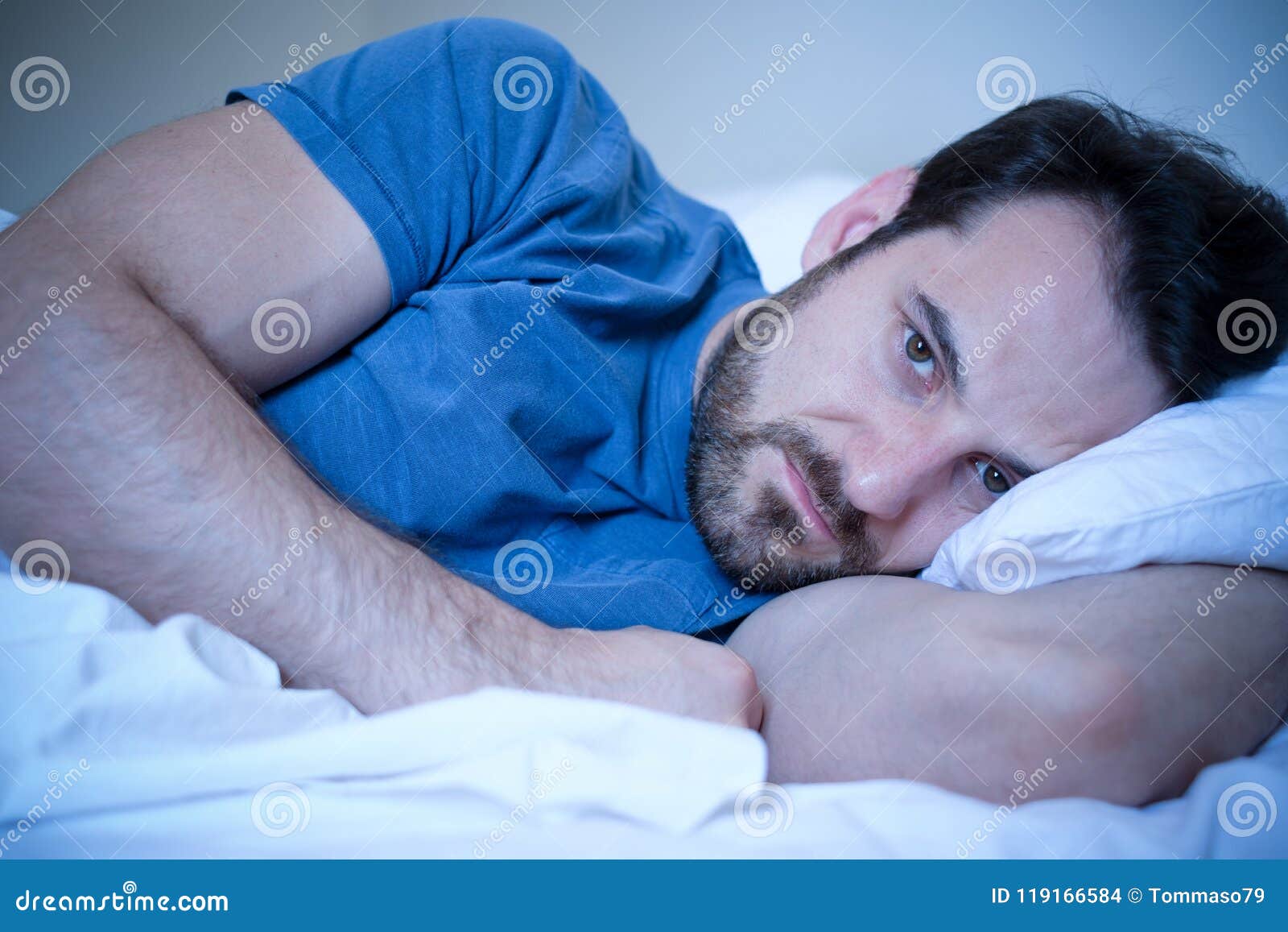 Man Feeling Sick and Sad at Night Lying in His Bed Stock Photo ...