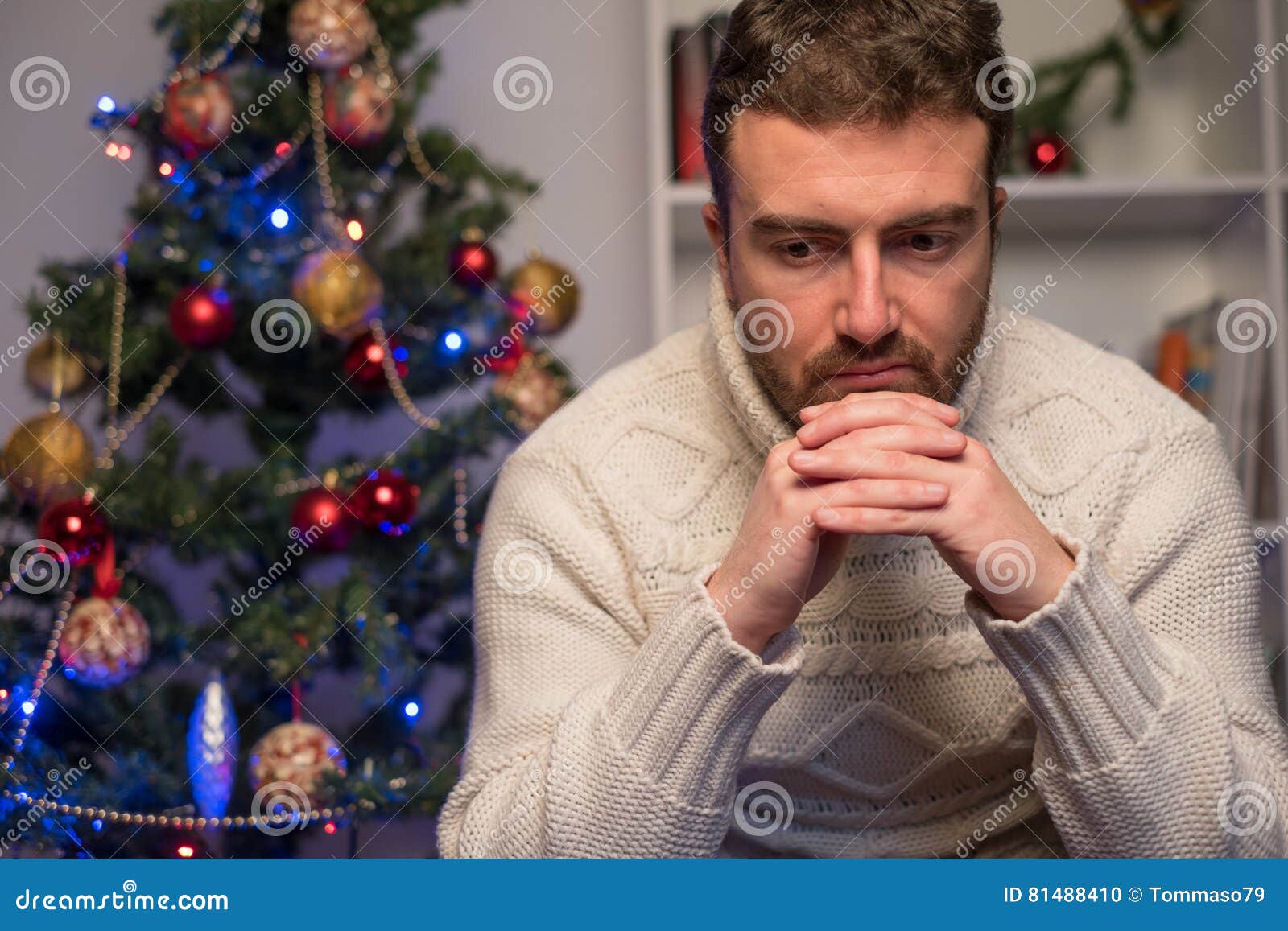 man felling depressed and lonely during the christmas time