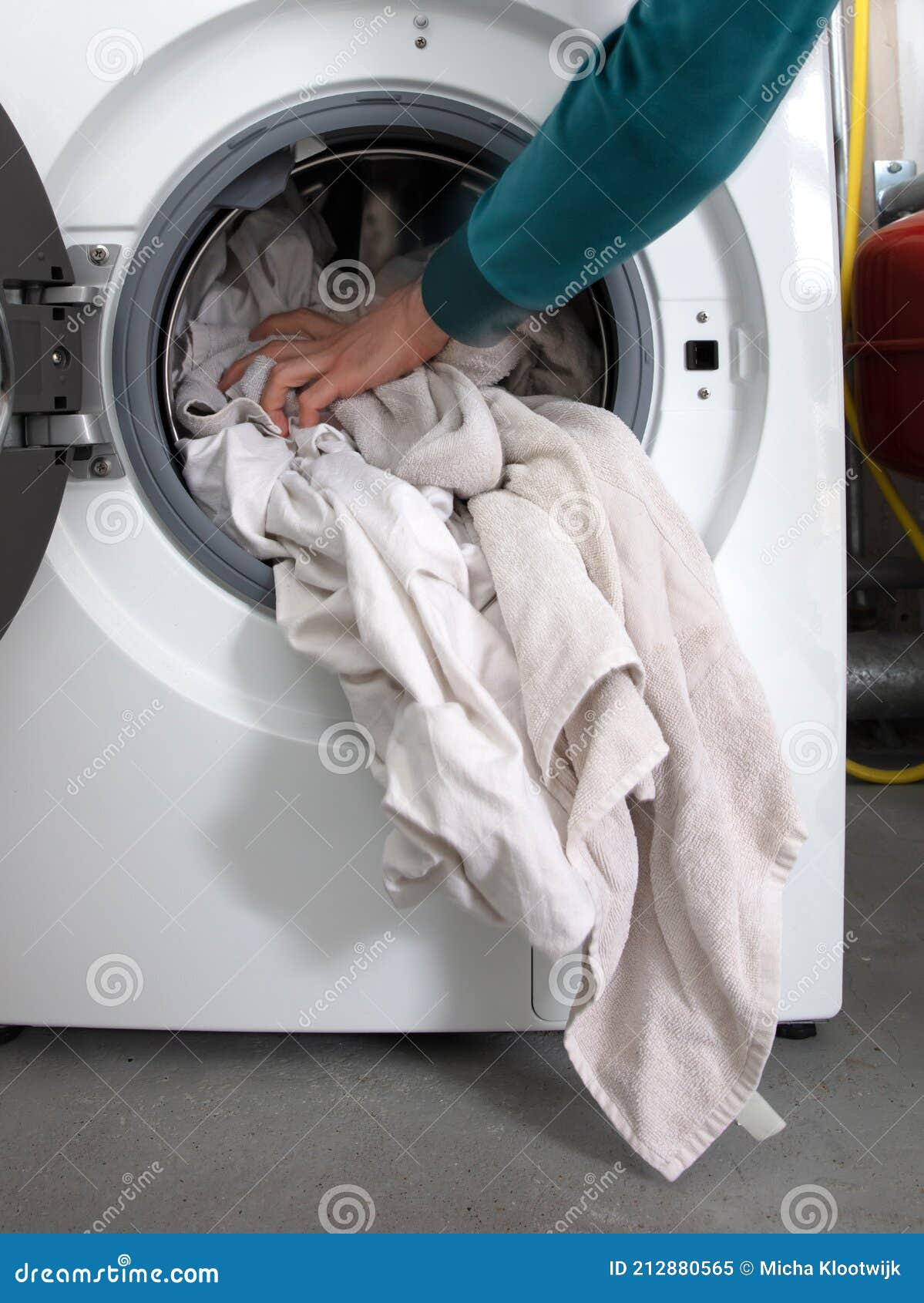 Man Filling Laundry In The Washing Machine Stock Image Image Of Modern Cleaning 212880565 