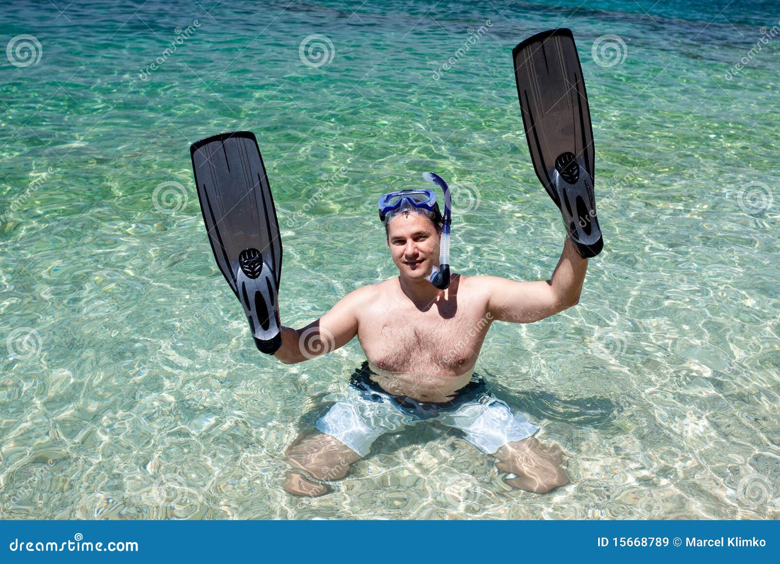 man with fins on the hands