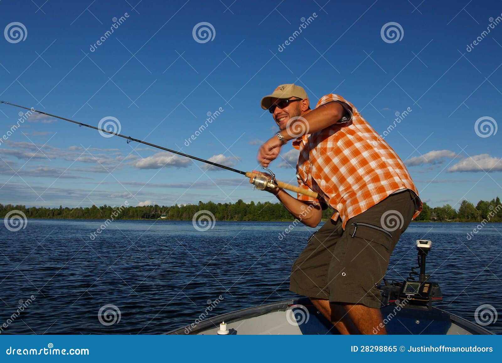 man fishing large mouth bass